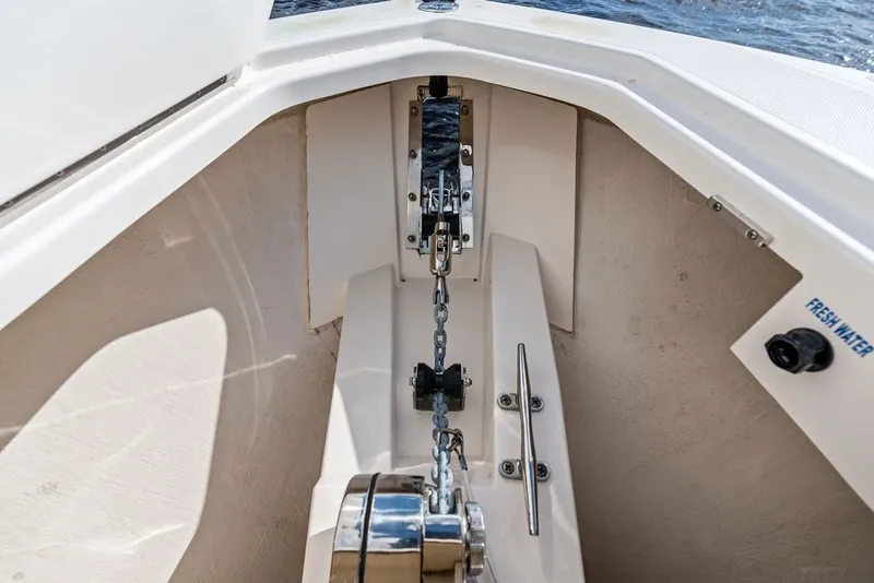 Slide: The Image of 2024 Tiara Yachts 38 LS anchor chain and fresh water outlet detail. - 27
