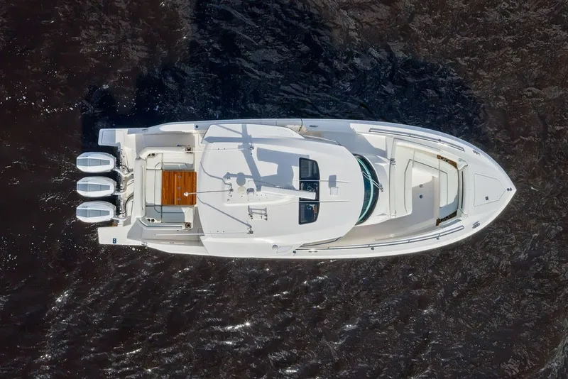 Slide: The Image of Aerial view of 2024 Tiara Yachts 38 LS boat on water. - 8