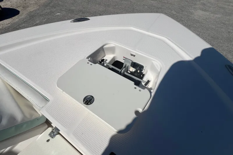 Slide: The Image of 2024 Robalo 206 Cayman boat deck with storage compartment open. - 21