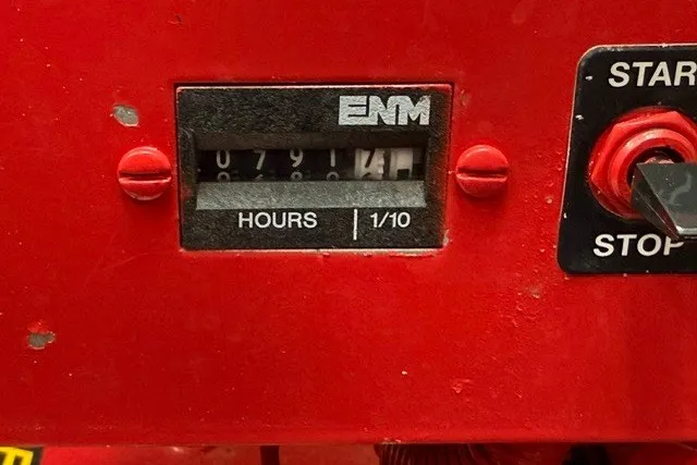 Slide: The Image of Hour meter on a 2000 Sea Ray 340 Sundancer boat dashboard. - 58