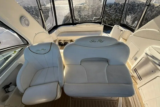 Slide: The Image of Interior of a 2000 Sea Ray 340 Sundancer boat with white seating. - 19