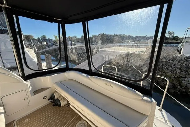 Slide: The Image of Interior view of 2000 Sea Ray 340 Sundancer yacht with dockside scenery. - 9