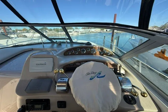 Slide: The Image of Cockpit view of a 2000 Sea Ray 340 Sundancer with Garmin navigation system. - 20