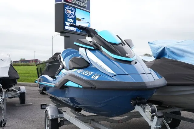 Slide: The Image of A blue 2024 Yamaha WaveRunner FX Cruiser HO sits on a trailer outdoors. - 3