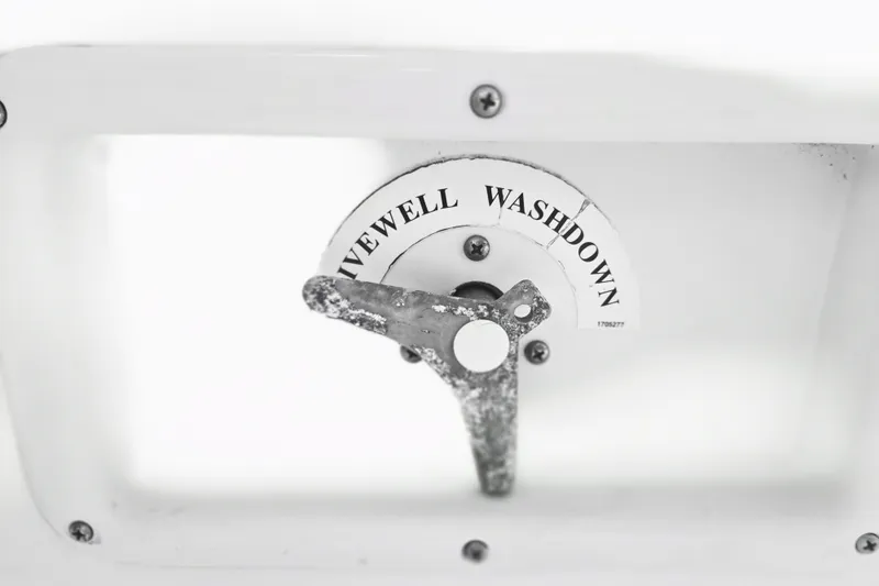Slide: The Image of Livewell washdown control on a 2005 Trophy 2352 Walkaround boat. - 26