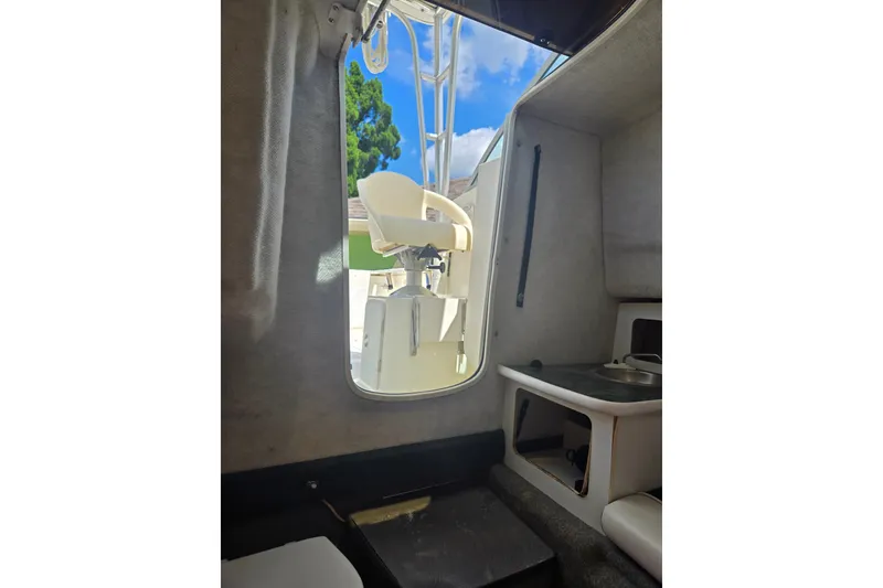 Slide: The Image of Interior view of 2005 Trophy 2352 Walkaround boat, showing cabin and seating area. - 42