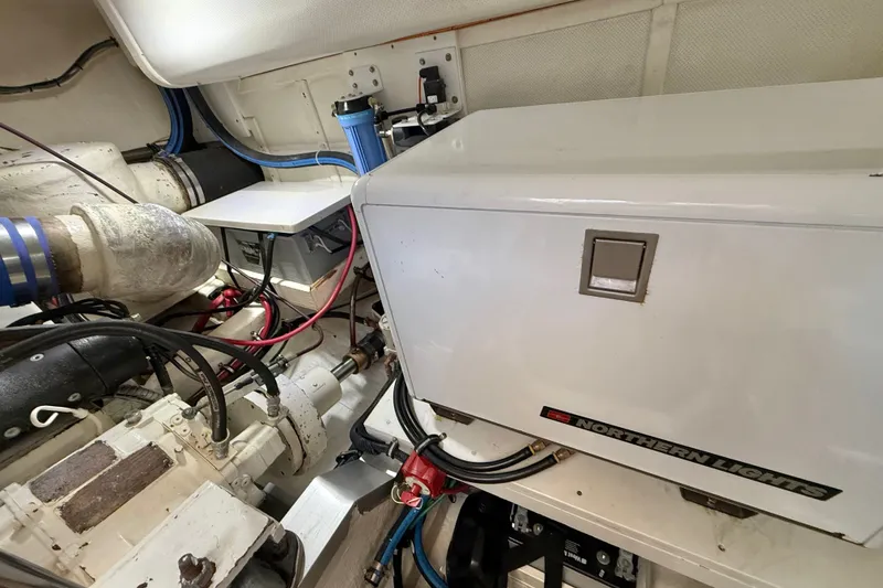 Slide: The Image of Engine room of 1999 Grand Banks 38 Eastbay EX with Northern Lights generator. - 47