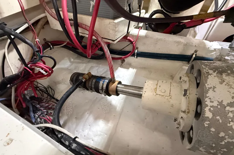 Slide: The Image of Engine compartment of 1999 Grand Banks 38 Eastbay EX with visible wiring and components. - 48