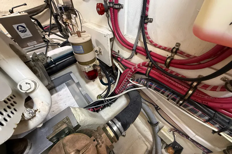 Slide: The Image of Engine room wiring and components of a 1999 Grand Banks 38 Eastbay EX boat. - 44