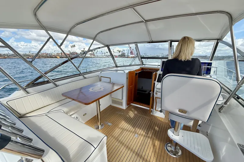 Slide: The Image of Helm of 1999 Grand Banks 38 Eastbay EX with seating and ocean view. - 12