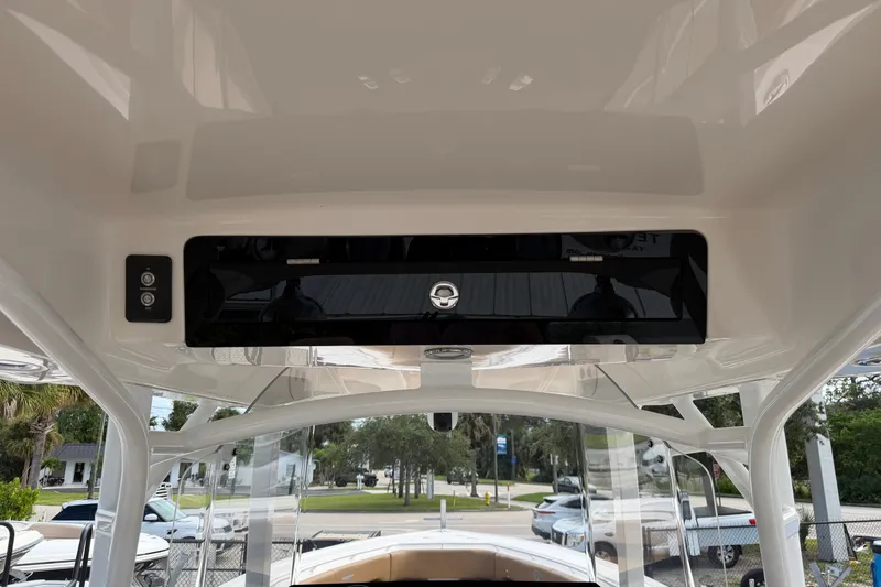 Slide: The Image of 2021 Fountain 38 CC LS boat interior, featuring sleek design and modern controls. - 16