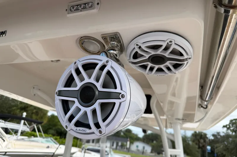 Slide: The Image of Outdoor speakers on a 2021 Fountain 38 CC LS boat, featuring JL Audio equipment. - 17