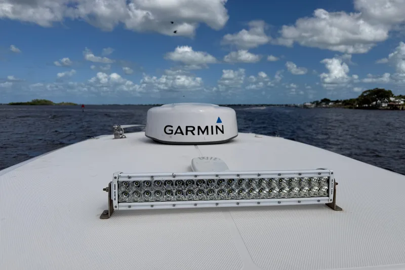Slide: The Image of 2021 Fountain 38 CC LS boat with Garmin radar and LED light bar on deck. - 21
