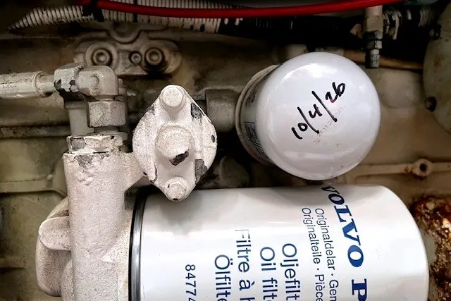 Slide: The Image of Oil filter system in a 2005 Cruisers Yachts 440 Express engine compartment. - 10