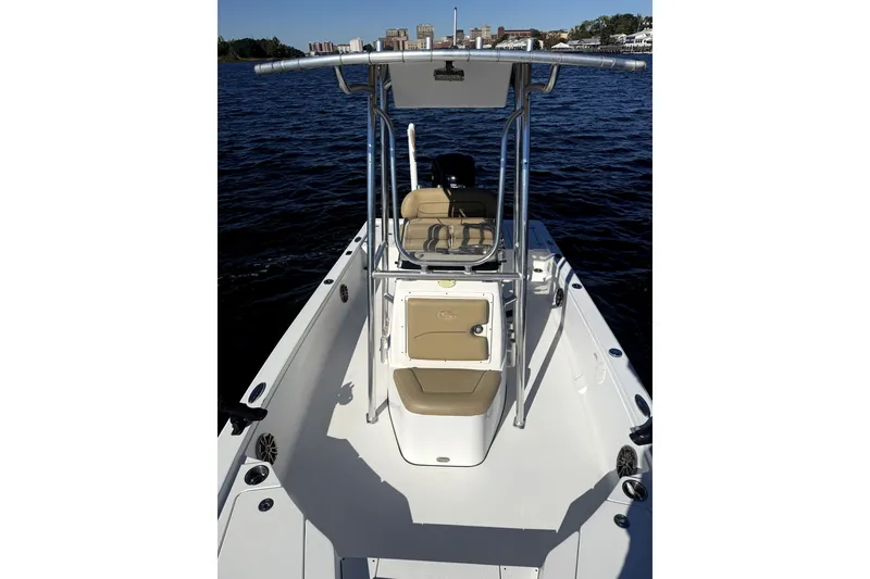 Slide: The Image of 2017 Sportsman Tournament 214 Bay Boat on water, featuring center console and seating. - 13