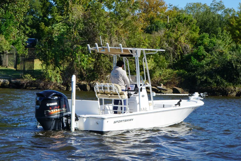 Slide: The Image of 2017 Sportsman Tournament 214 Bay Boat cruising on a scenic river. - 5