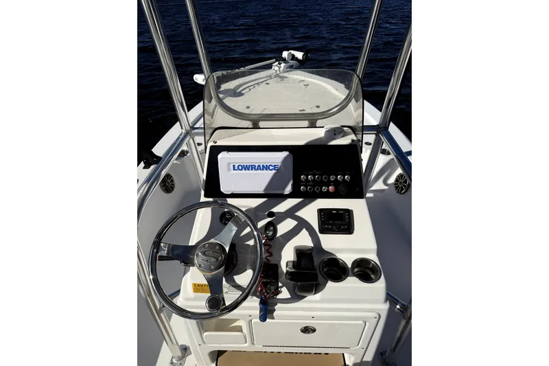 Slide: The Image of 2017 Sportsman Tournament 214 Bay Boat console with Lowrance display and steering wheel. - 23