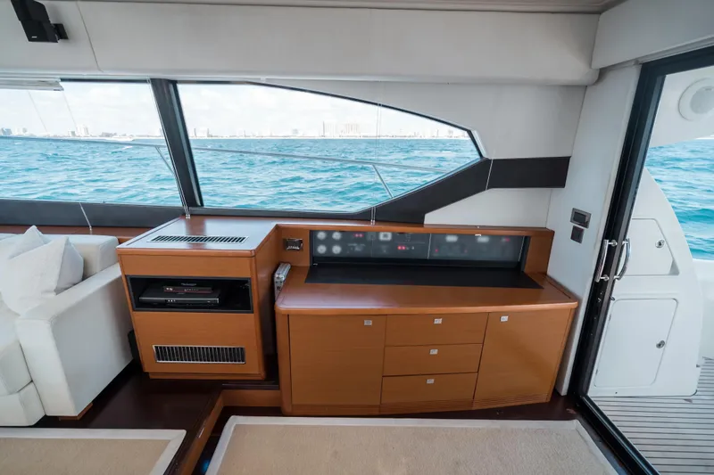 Slide: The Image of Luxurious interior of 2014 Prestige 620 yacht with wooden cabinetry and ocean view. - 29