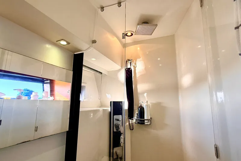 Slide: The Image of Luxurious bathroom interior of 2014 Prestige 620 yacht with modern fixtures and lighting. - 43