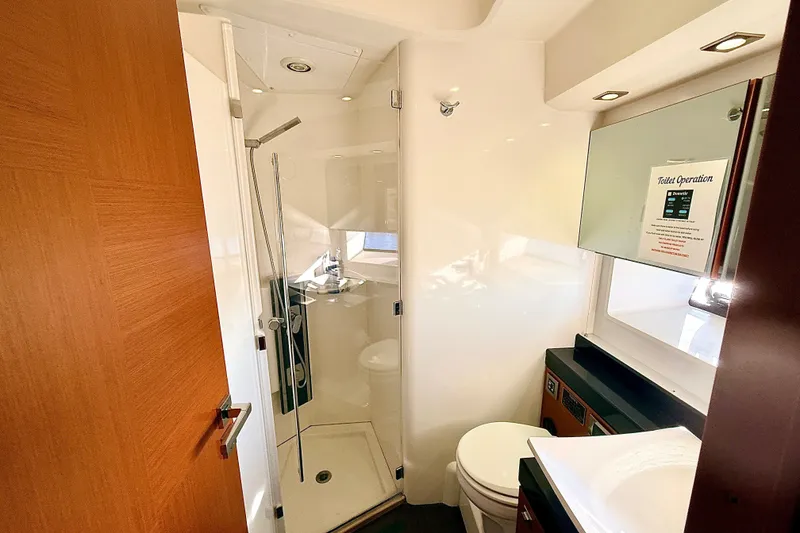 Slide: The Image of Luxurious bathroom in 2014 Prestige 620 yacht with shower and modern amenities. - 47