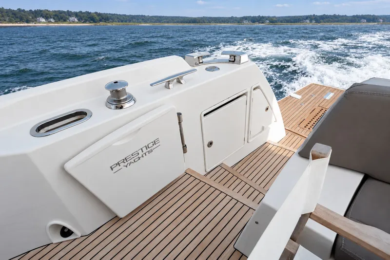 Slide: The Image of Luxury 2014 Prestige 620 yacht deck with ocean view and sleek design. - 10