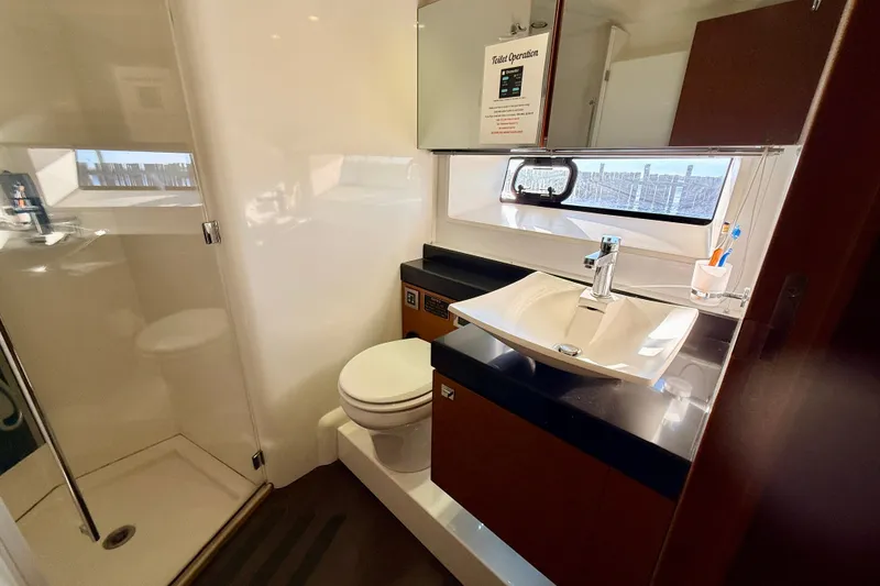 Slide: The Image of Luxurious bathroom in 2014 Prestige 620 yacht with modern fixtures and shower. - 46