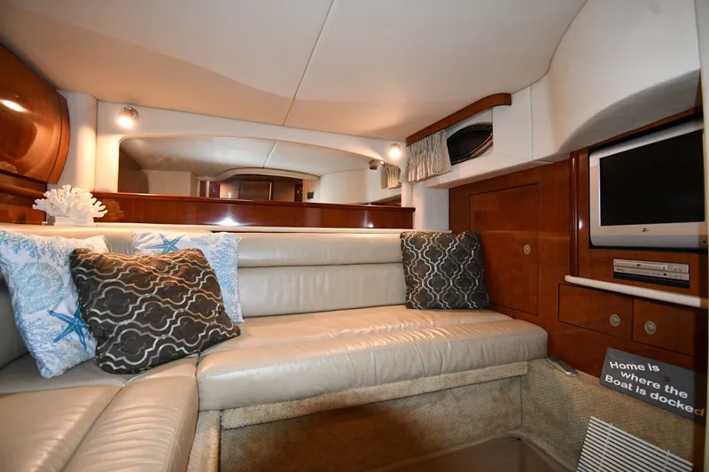 Slide: The Image of Luxurious interior of 2005 Sea Ray 420 Sundancer yacht with plush seating and entertainment system. - 40
