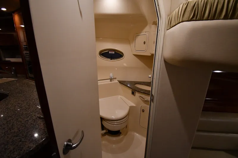 Slide: The Image of Interior of 2005 Sea Ray 420 Sundancer yacht bathroom with modern amenities. - 41