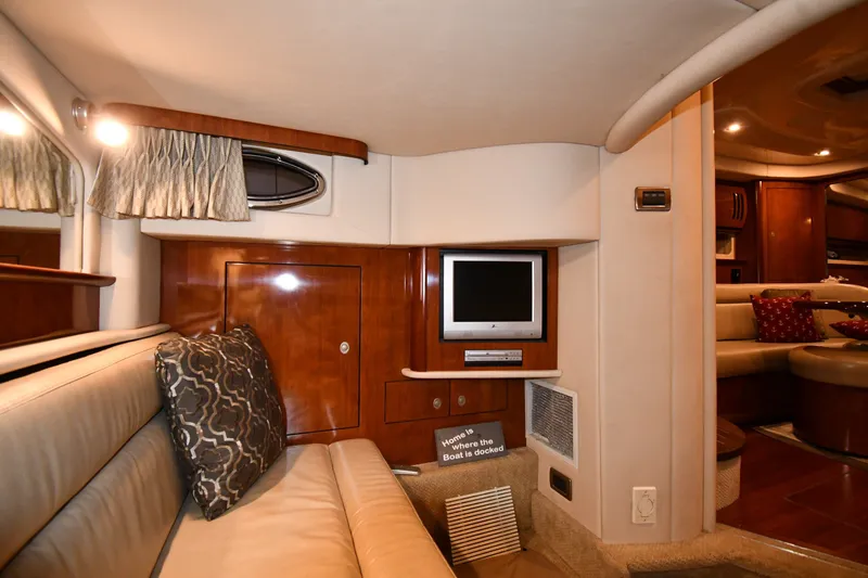 Slide: The Image of Luxurious interior of 2005 Sea Ray 420 Sundancer yacht with cozy seating and entertainment area. - 39