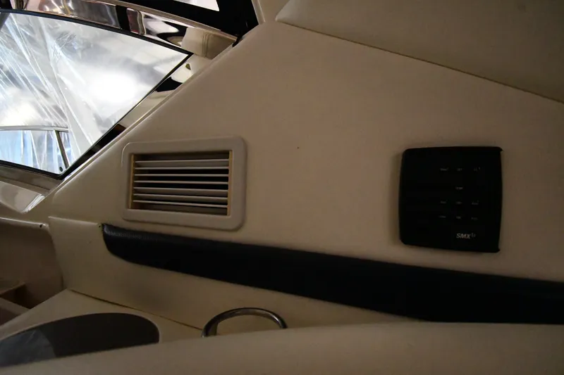 Slide: The Image of Interior view of a 2005 Sea Ray 420 Sundancer yacht with control panel and vent. - 44