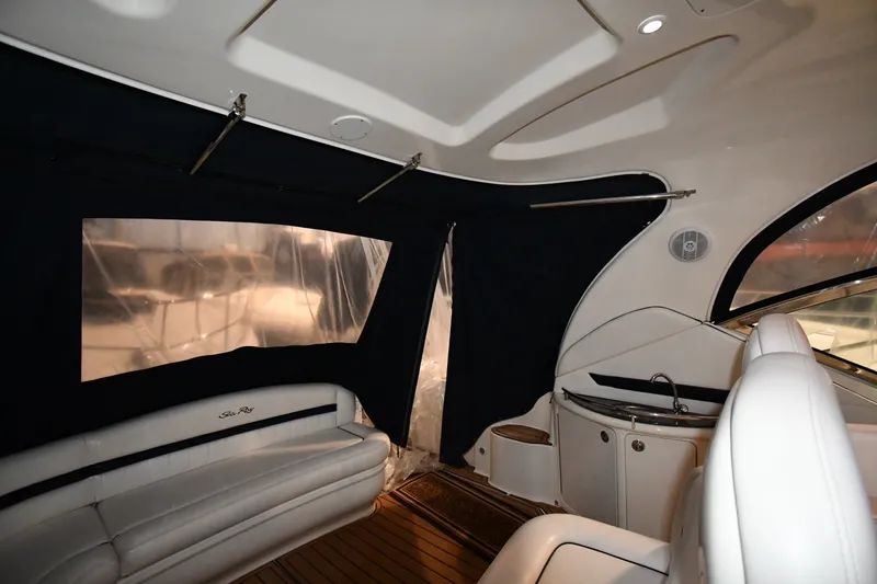 Slide: The Image of Interior of 2005 Sea Ray 420 Sundancer yacht with seating and kitchenette. - 14