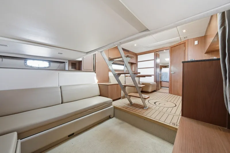 Slide: The Image of Luxurious interior of 2012 Sea Ray 450 Sundancer yacht with modern furnishings and elegant design. - 35