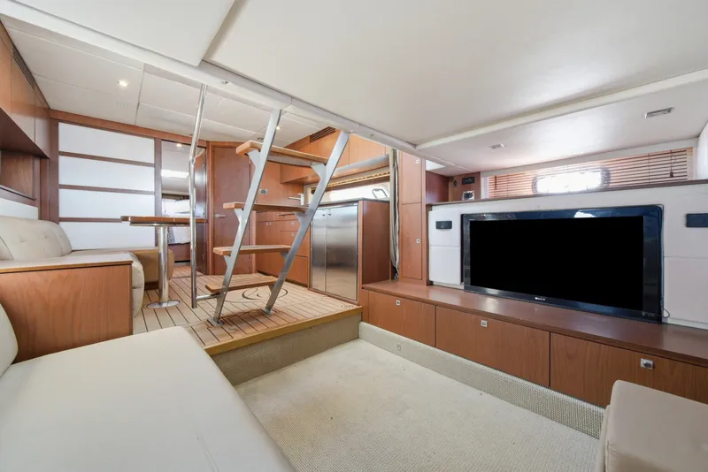Slide: The Image of Luxurious interior of 2012 Sea Ray 450 Sundancer yacht with modern furnishings. - 36