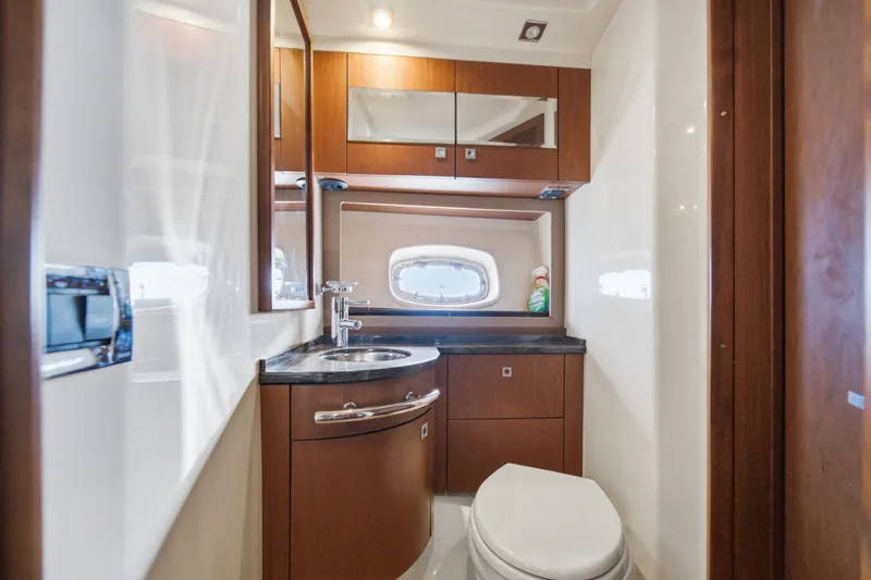 Slide: The Image of Luxurious bathroom interior of 2012 Sea Ray 450 Sundancer yacht with wood cabinetry. - 39