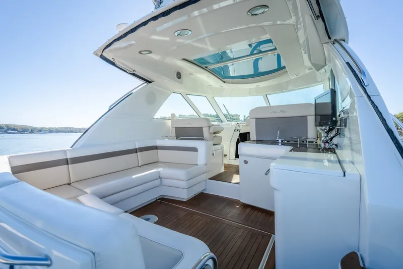 Slide: The Image of Luxurious 2012 Sea Ray 450 Sundancer yacht interior with spacious seating and modern amenities. - 14