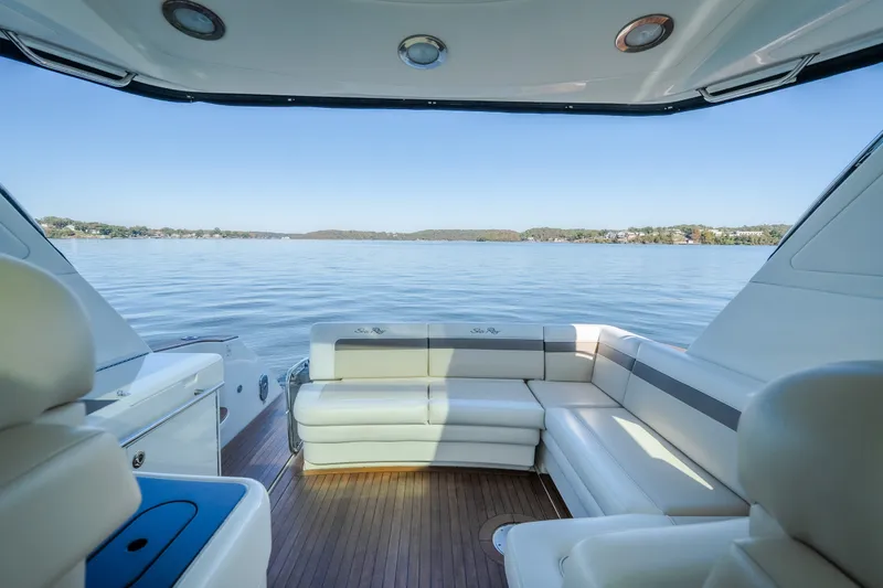 Slide: The Image of Interior view of 2012 Sea Ray 450 Sundancer yacht with lake backdrop. - 22