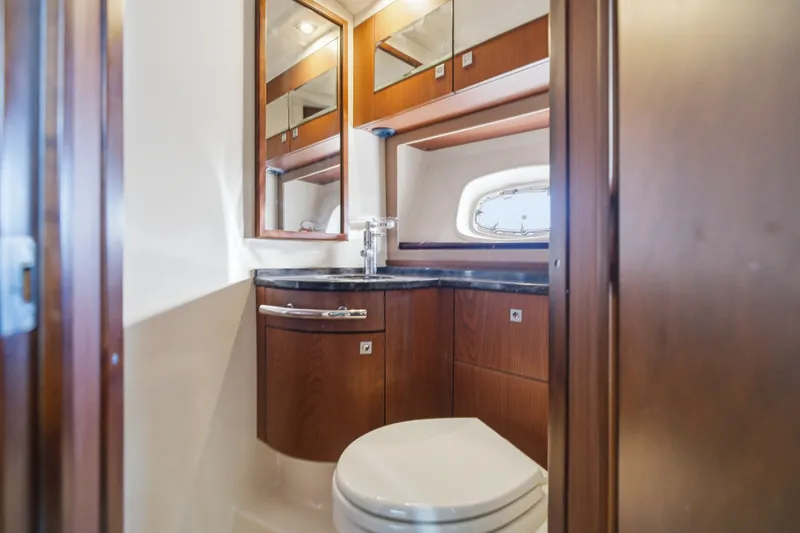 Slide: The Image of Luxurious bathroom interior of 2012 Sea Ray 450 Sundancer yacht with wood cabinetry. - 41