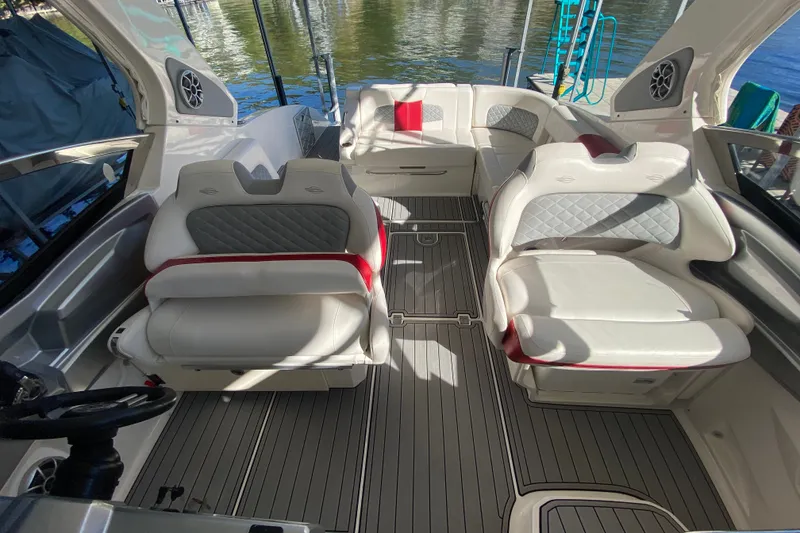 Slide: The Image of 2012 Chaparral 327 SSX boat interior with luxurious seating and modern design. - 27