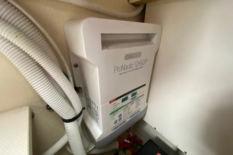 Slide: The Image of ProNautic 12-50P power charger installed in 2012 Chaparral 327 SSX boat. - 31