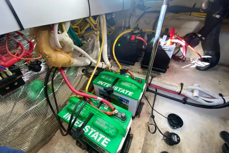 Slide: The Image of Battery compartment of a 2012 Chaparral 327 SSX boat with Interstate batteries. - 35