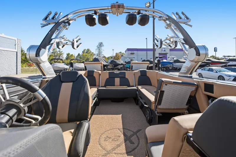 Slide: The Image of 2020 MasterCraft X24 boat interior with luxury seating and advanced audio system. - 35