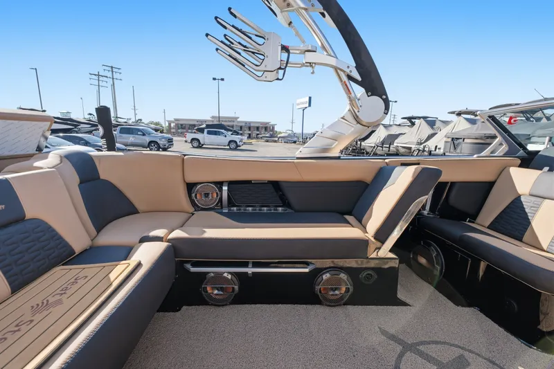 Slide: The Image of 2020 MasterCraft X24 boat interior with luxurious seating and modern design features. - 38