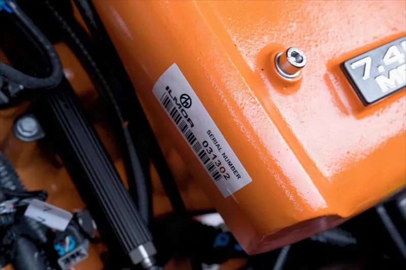 Slide: The Image of Close-up of 2020 MasterCraft X24 engine with serial number label and wiring. - 20