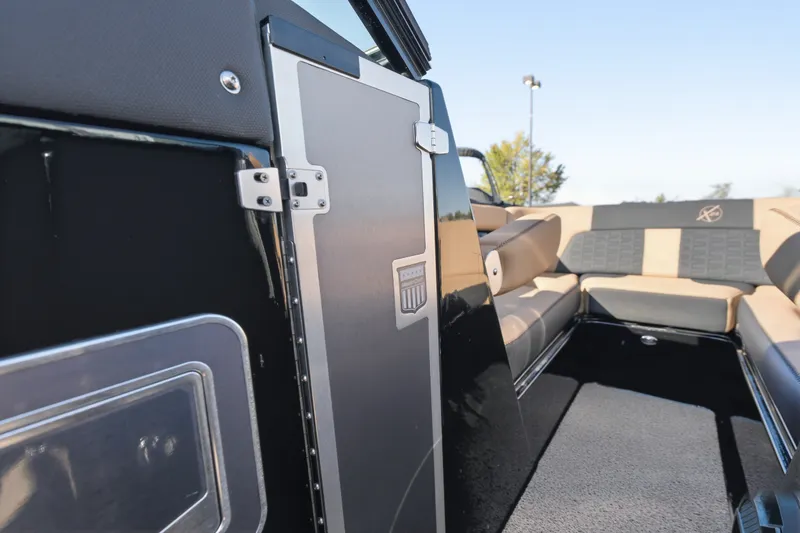 Slide: The Image of 2020 MasterCraft X24 interior with sleek seating and modern design elements. - 13