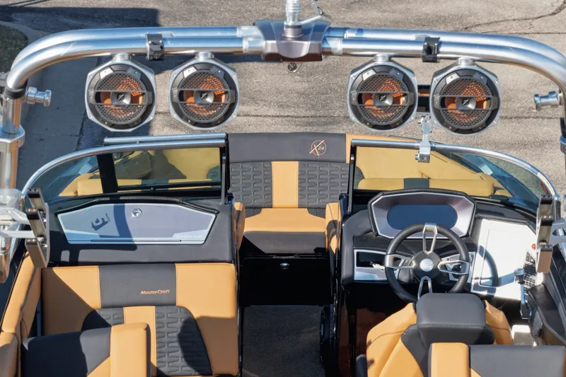 Slide: The Image of 2020 MasterCraft X24 boat interior with premium seating and advanced audio system. - 41