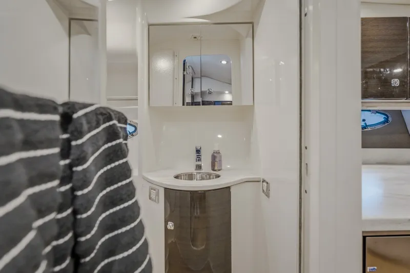 Slide: The Image of Interior of 2017 Formula 37 Performance Cruiser bathroom with sink and mirror. - 51
