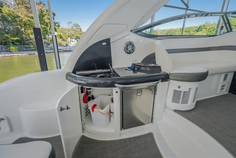 Slide: The Image of 2017 Formula 37 Performance Cruiser interior with kitchenette and seating area. - 64