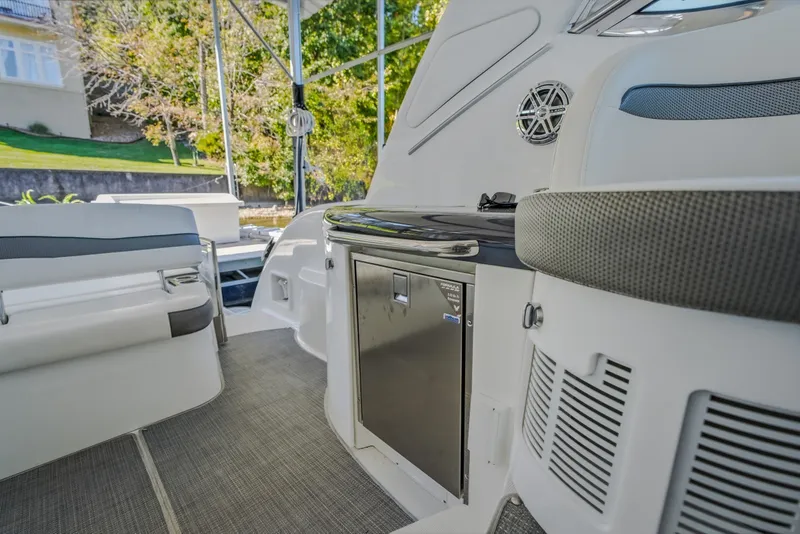 Slide: The Image of 2017 Formula 37 Performance Cruiser interior with seating and kitchenette. - 35