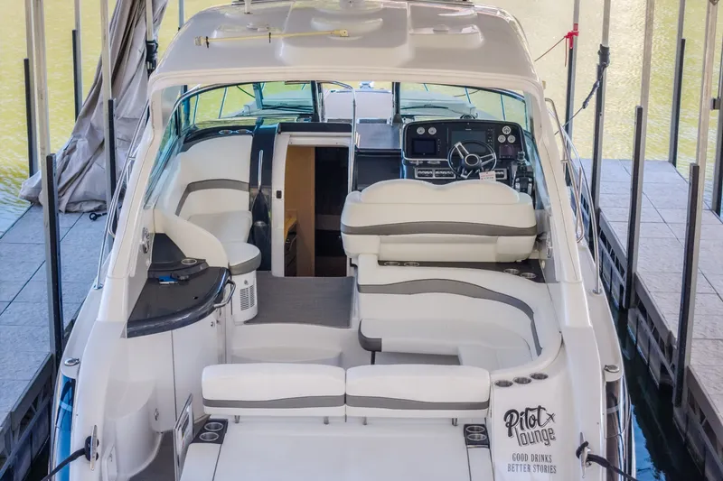Slide: The Image of 2017 Formula 37 Performance Cruiser interior with plush seating and modern dashboard. - 14
