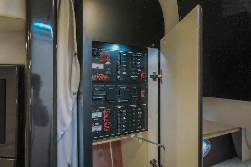 Slide: The Image of Electrical panel inside a 2017 Formula 37 Performance Cruiser yacht cabin. - 76